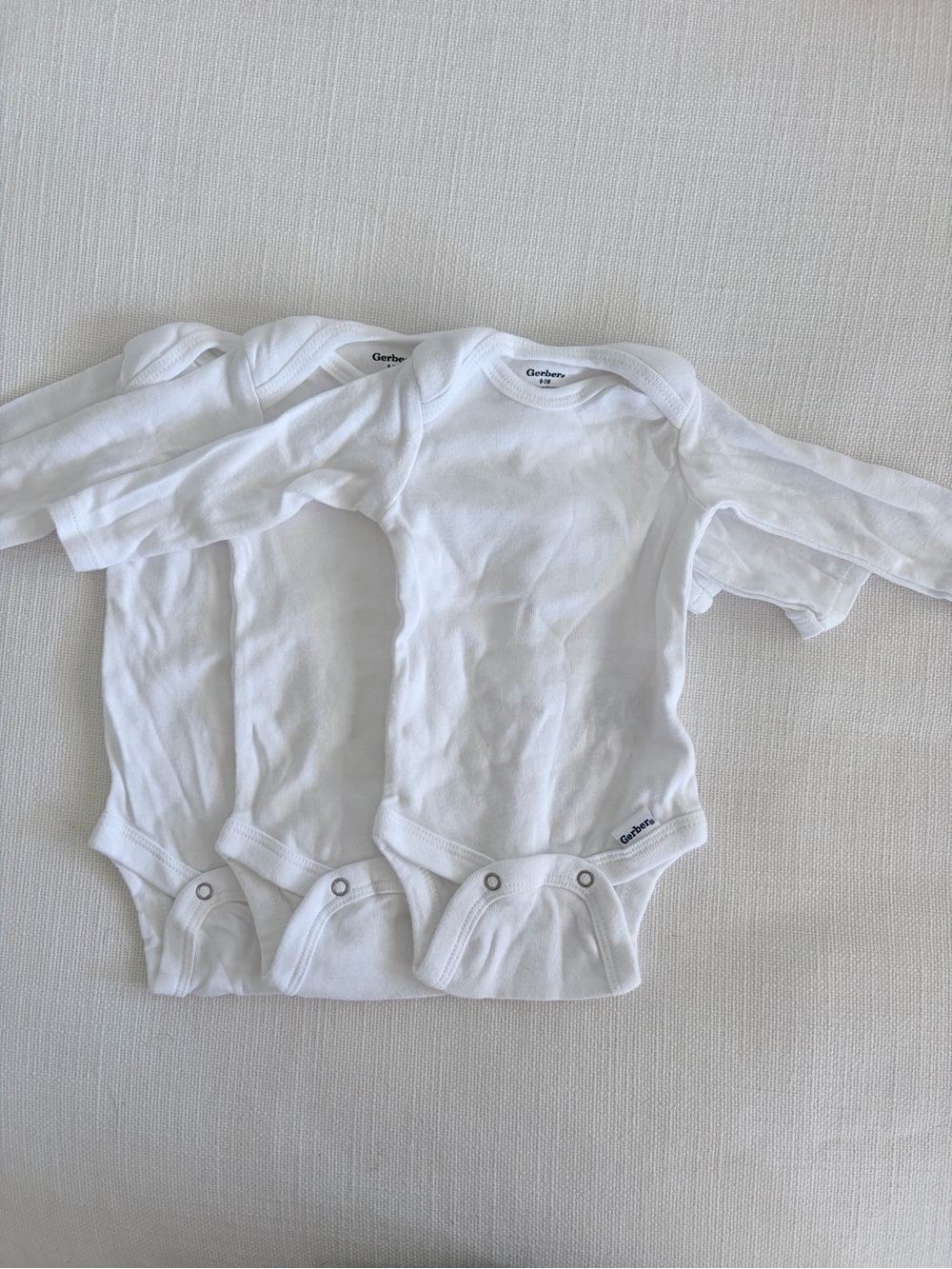 Gerber White Long-Sleeve Baby One-Piece Bodysuits - 3 Pack
